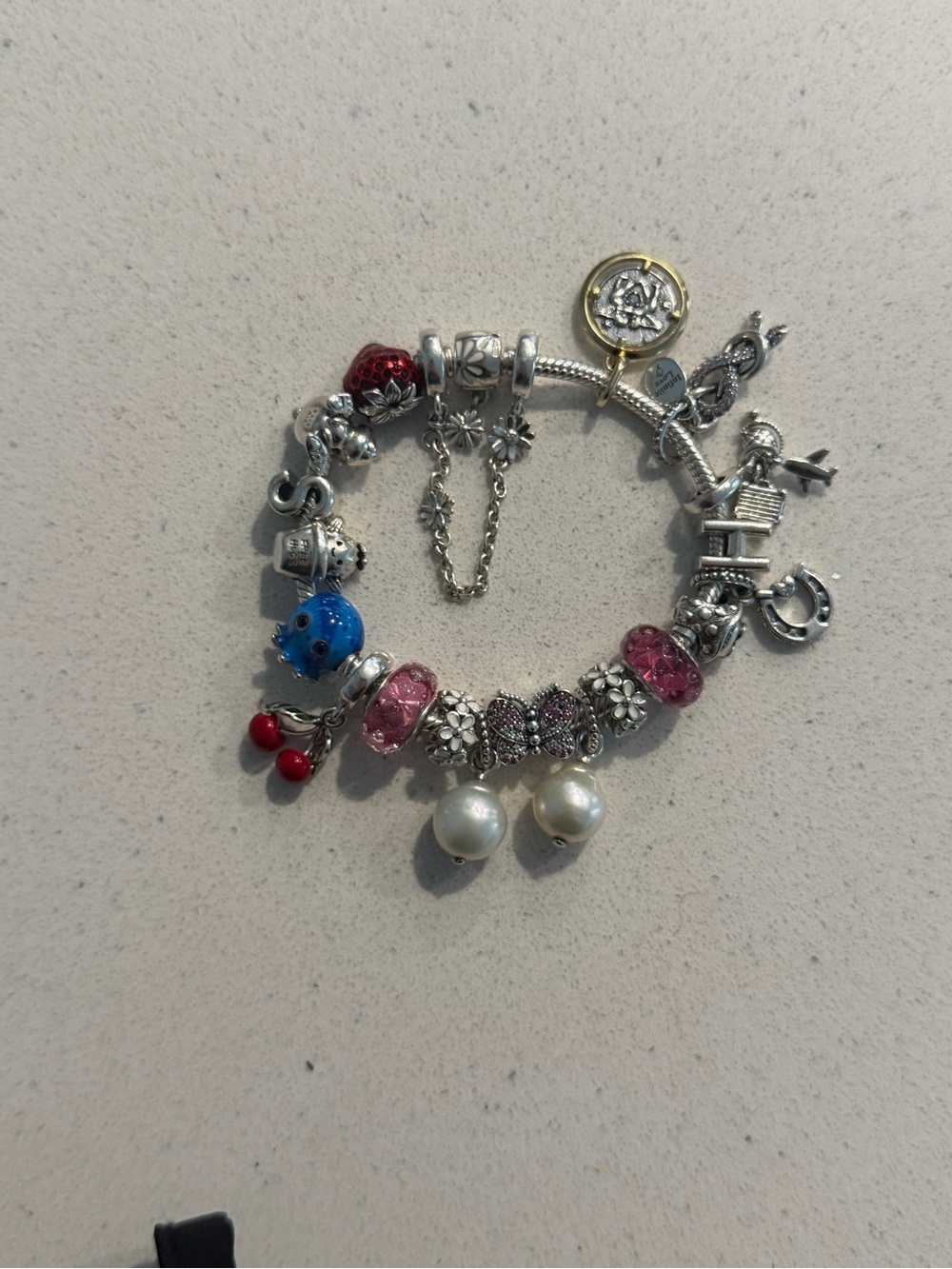 Pandora Charm Bracelet complete with charms and a safety chain